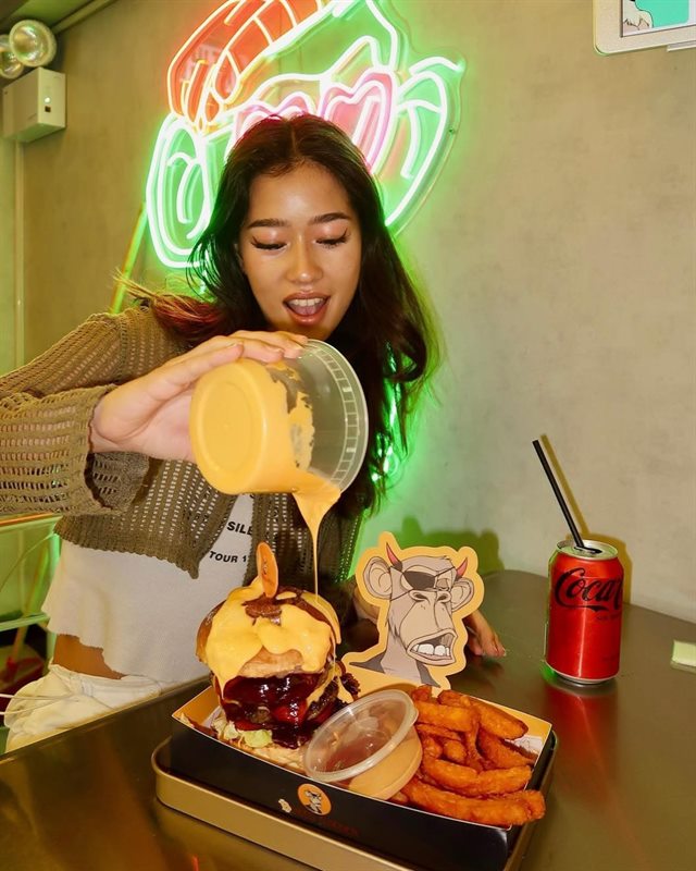 Restaurant case, Hong Kong — model content under neon